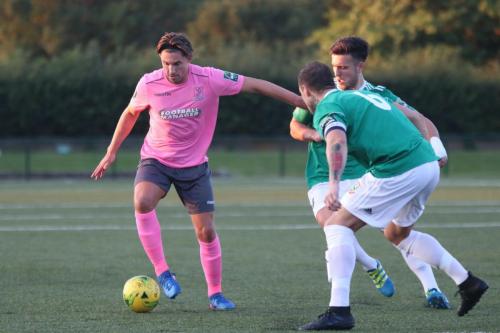 Enfields Sam Youngs and Hendons Arthur Lee (front) and Luke Tingey