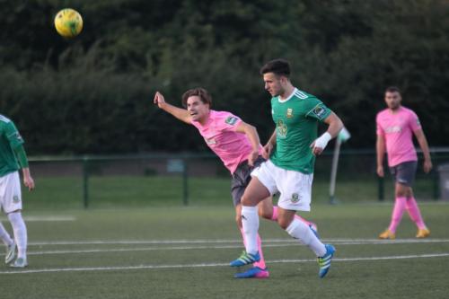 Hendons Luke Tingey (green) clears from Sam Youngs