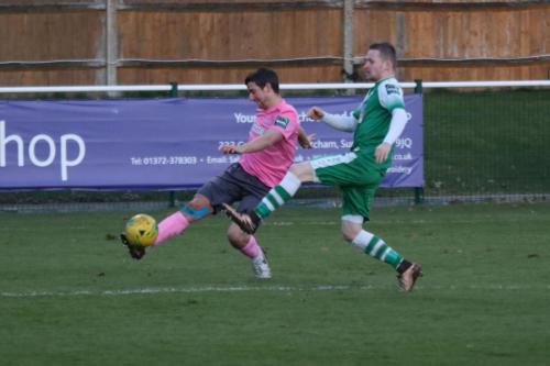 Enfields Elliot Benyon crosses from the right wing