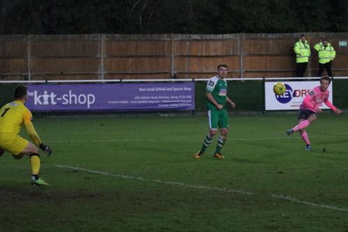 Enfields Mickey Parcell (R) curls in a shot