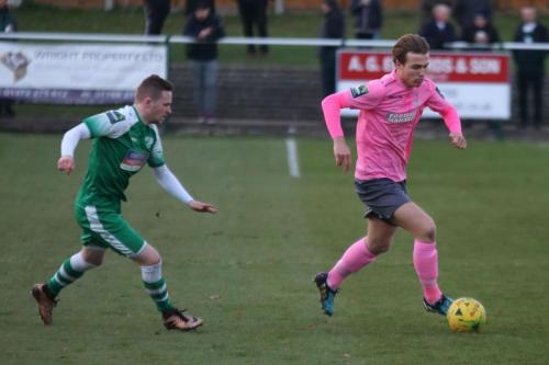 Enfields Mickey Parcell (R) cuts in from the right wing past Tom Richards