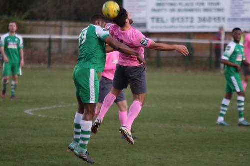 Leatherheads Jerry Nnamani (L) and Enfields Mario Noto