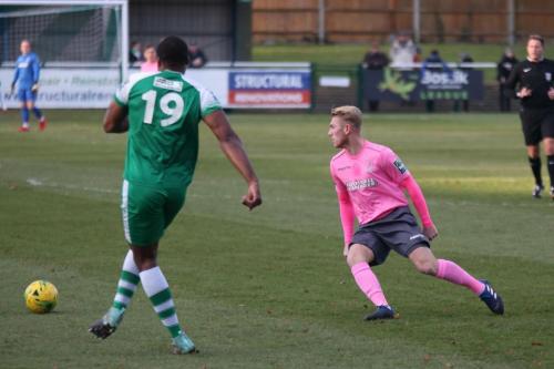 Leatherheads Jerry Nnamani (L) clears from Ryan Blackman