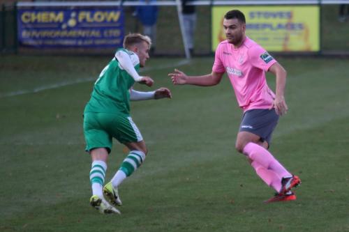 Leatherheads Liam Nash (L) and Enfields Taylor McKenzie