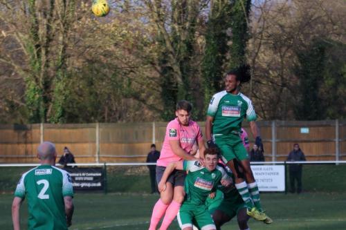 Leatherheads Yannis Ambroisine (R) heads clear from Dan Rumens