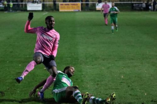 Leatherheads Yannis Ambroisine (R) slides the ball away from Ryan Blake