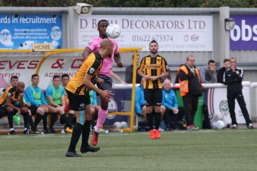 Maidstones Alex Finney (amber black) heads clear from Ryan Blake