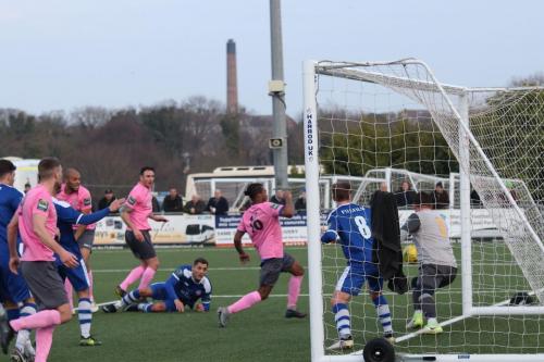 Denell Wynter (16) follows up but his initial effort has enough pace to cross the line for Enfields late equalise