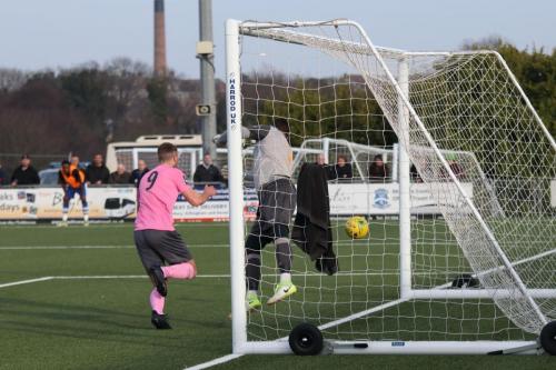 Enfields Brad Wadkins hasnt yet realised that hes been given offside and the goal has been disallowed