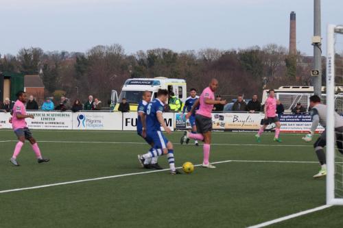 Enfields Simon Thomas (pink) decides to step over the ball rather than shoot, presumably thinking there was a team mate in a better position  There wasnt