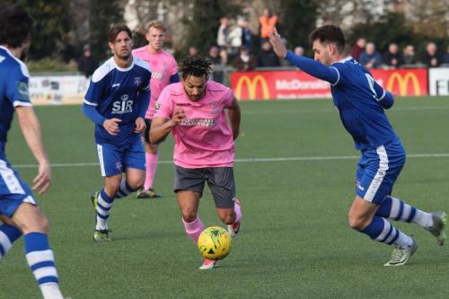 Enfields Tyler Campbell and Margates Jay May (R) and James Rogers