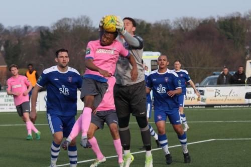 Margate keeper Lenny Pidgeley catches under pressure from Dernell Wynter  Although the ball briefly escaped ,Pidgeley caught the rebound