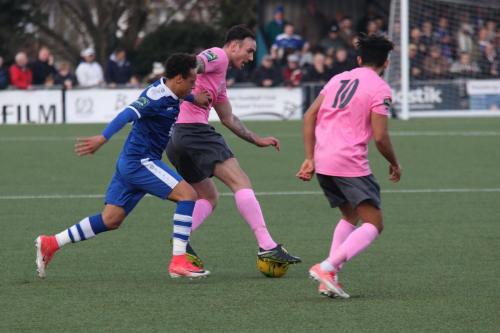 Margates Aaron Simpson (L) challenges Matt Johnson