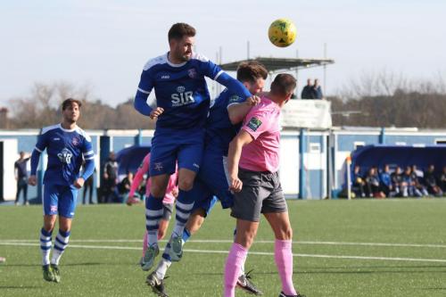 Margates Jay May (blue, L) heads clear