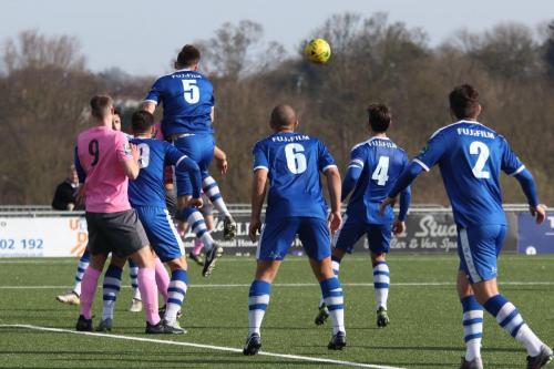 Margates Liam Friend (5) heads clear from a corner