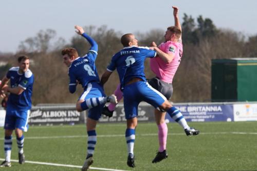 Margates Sam Blackman (L) and Tom Wynter and Enfields Brad Wadkins all miss the ball