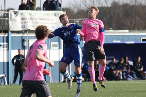 Margates Sam Blackman (blue) challenges his Enfield namesake Ryan