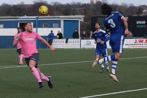 Margates Tom Mills (3) heads clear from Brad Wadkins