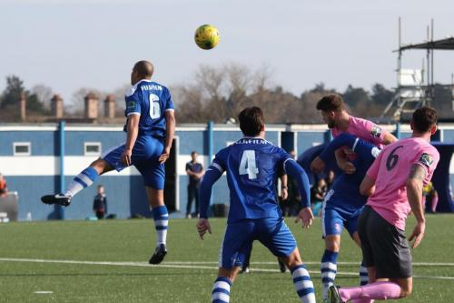 Margates Tom Wynter (6) heads clear