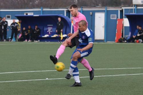 Margates Tom Wynter (blue) blocks Brad Wadkins attempted shot