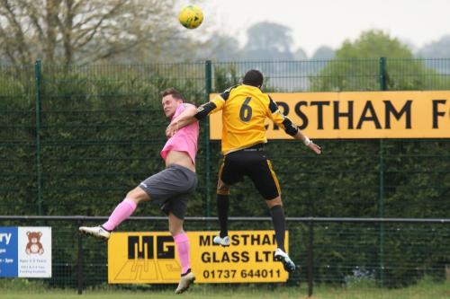 Enfields Liam Hope (L) and Mersthams Tutu Henriques