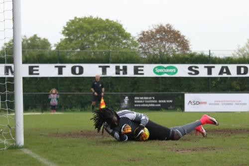 Mersthams Ashlee Jones saves a long-range effort