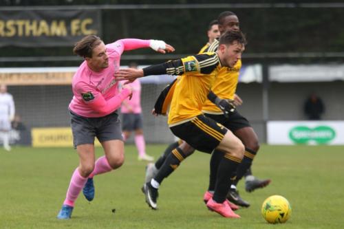 Mersthams Ben Harrison (R) and Enfields Sam Youngs