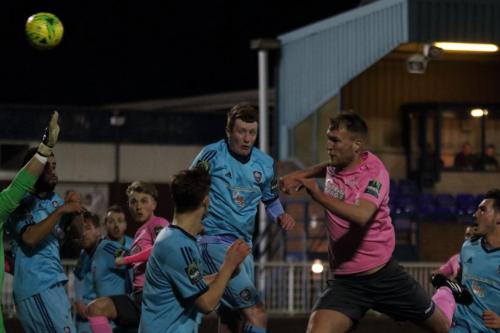 Brad Wadkins (pink) gives Enfield an early lead