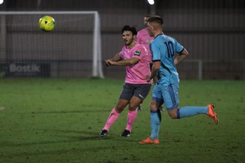 Enfields Mario Noto (L) and Mets Callum Keeley