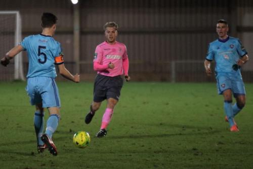 Enfields Ryan Blackman (pink) and Mets Olli Robinson (L) and Callum Keeley120