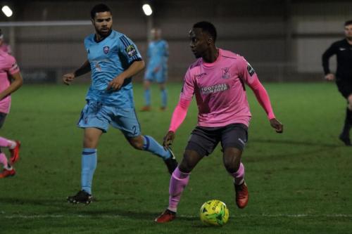 Enfields Ryan Blake (R) and Mets Rylan Myers