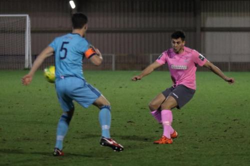 Enfields Samir Bihmoutine (R) and Mets Olli Robinson