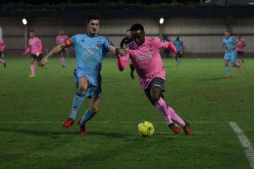 Mets Olli Robinson (L) and Enfields Ryan Blake