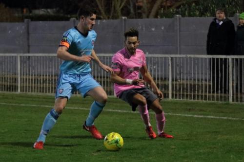 Mets Olli Robinson (L) and Enfields Tyler Campbell