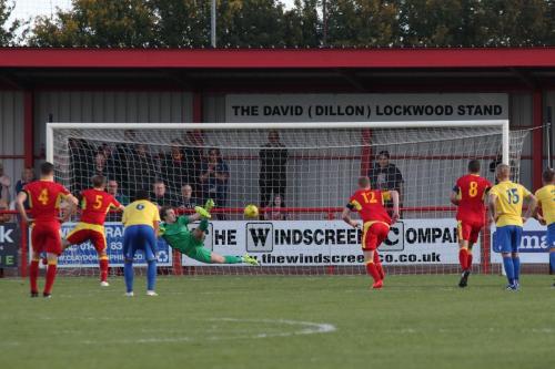 Dan Morphew (5) scores Needhams late equaliser from the penalty spot