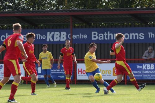 Enfields Sam Youngs (yellow) crosses