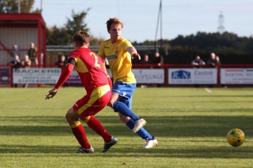 Needhams Jake Dye (L) and Enfields Aaron Greene