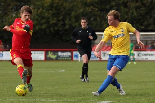 Needhams Jake Dye (L) and Enfields Aaron Greene211