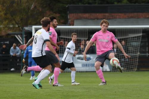 Enfields Aaron Greene (R) and Mario Noto and Roystons Scott Thomas