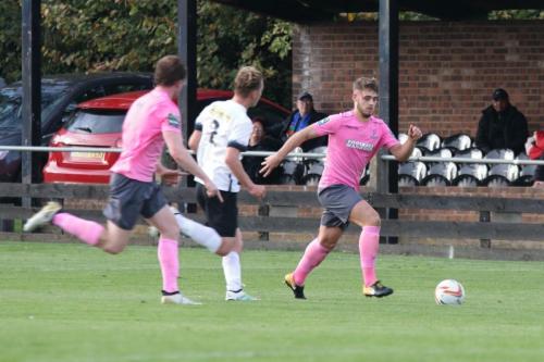 Enfields Dan Rumens (R) and Aaron Greene and Roystons Gus Scott-Morriss