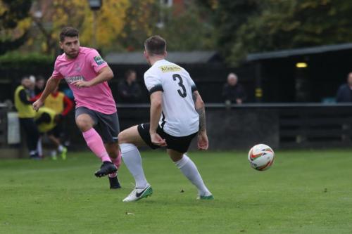 Enfields John Kyriacou (L) and Roystons Lee Chappell
