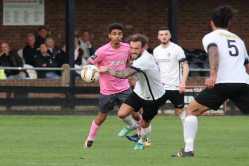 Enfields Montell Moore (pink) and Roystons Scott Thomas