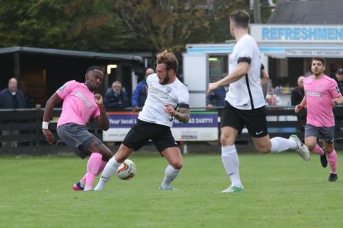 Enfields Ryan Blake (L) and Roystons Scott Thomas