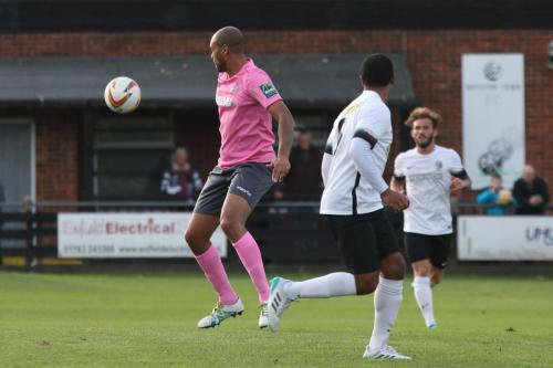 Enfields Simon Thomas (L) and Roystons Ed Asafu-Adjaye