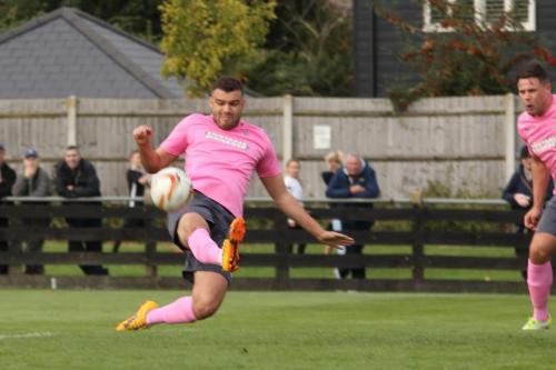 Enfields Taylor McKenzie cant get a clean contact on his shot