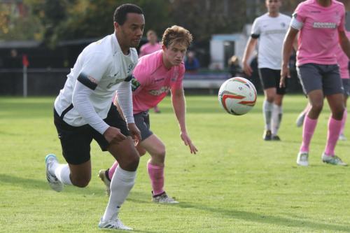Roystons Ed Asafu-Adjaye (L) and Enfields Aaron Greene