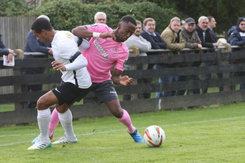 Roystons Ed Asafu-Adjaye (L) and Enfields Ryan Blake