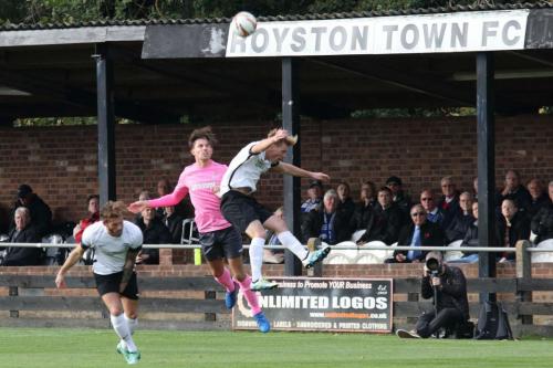 Roystons Scott Thomas (L) and Gus Scott-Morriss and Enfields Sam Youngs