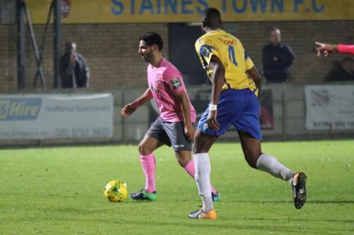 Enfields Mario Noto (L) and Staines Bayley Brown