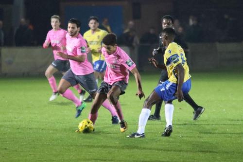 Enfields Montell Moore (pink, R) and Staines Wadah Ahmidi